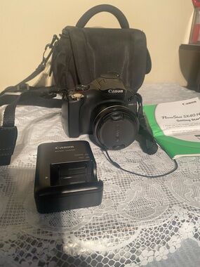 Canon PowerShot SX40 HS:  12.1 MP Digital Camera & Charger/Case